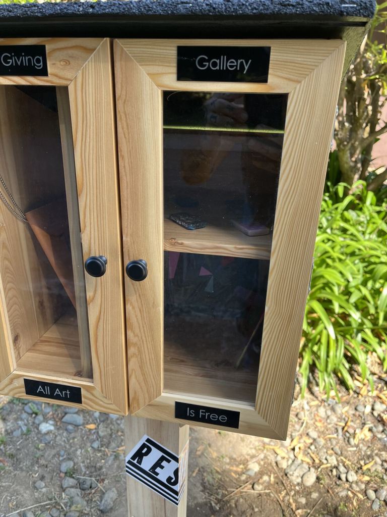 Close view of the installed Giving Gallery cabinet