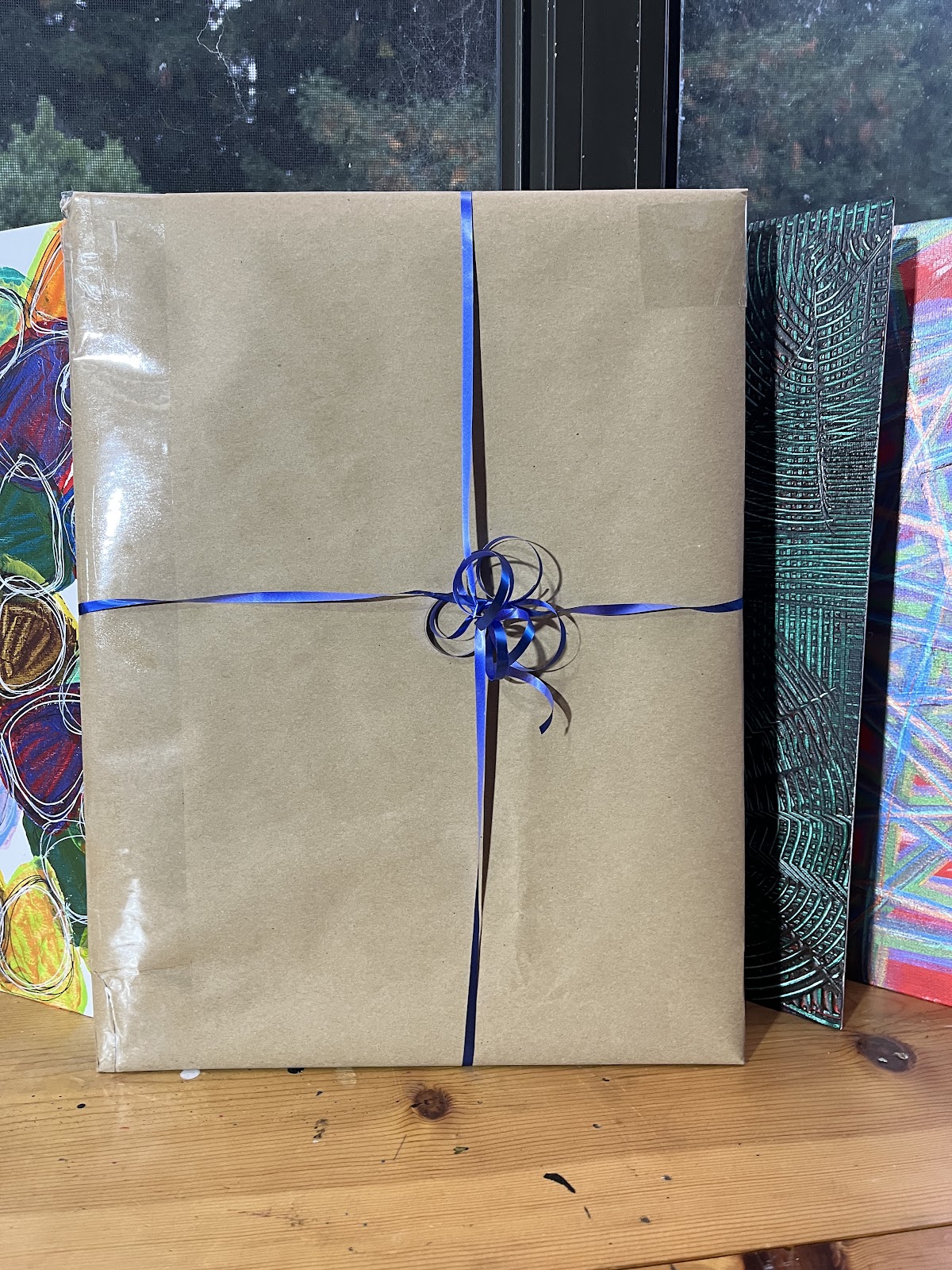 Gift-wrapped artwork prepared for Art Drop #8